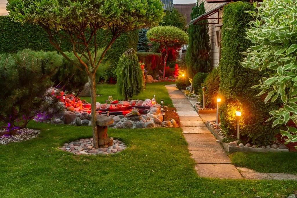 Installing Low Voltage Outdoor Lighting 3 Garden Illuminated By Lamps In Evening