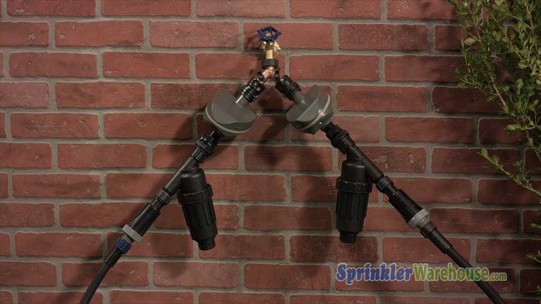 This video thumbnail shows a hose spigot with 2 drip system bib connections attached with a Y ball valve on a brick background.